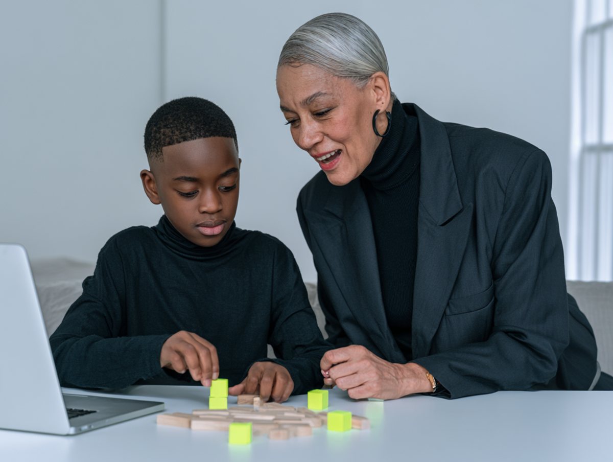 A mentor and a young learner exploring together